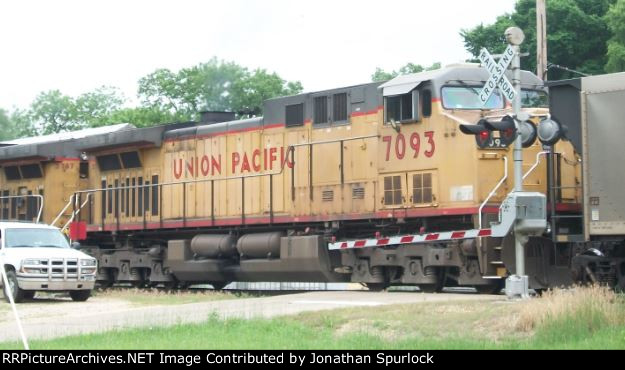 UP 7093 at a street crossing